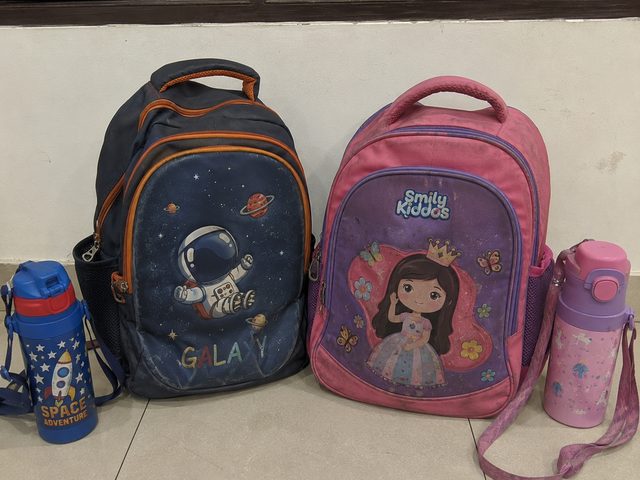 Kids school bags (2) with bottles